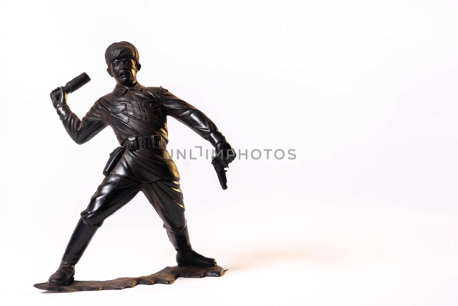 Vintage toy black soldier isolated on white background.