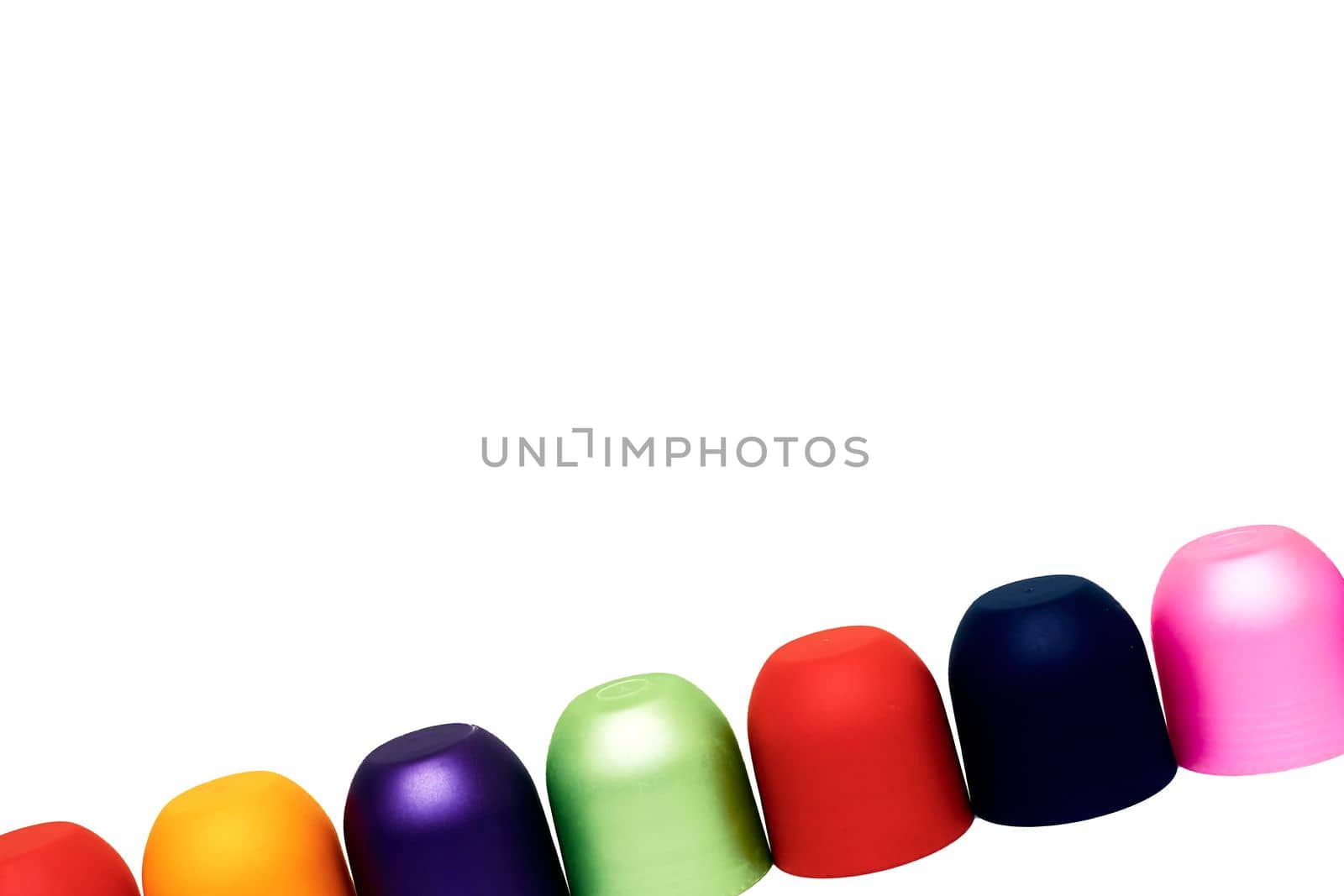 Multicolored bright cones cylinders caps and place for text on white by jovani68