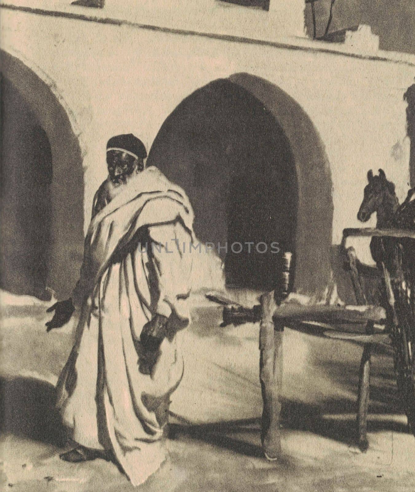 Black and white illustration shows an old Bedouin inside the courtyard. Vintage black and white picture shows adventure life in the previous century.