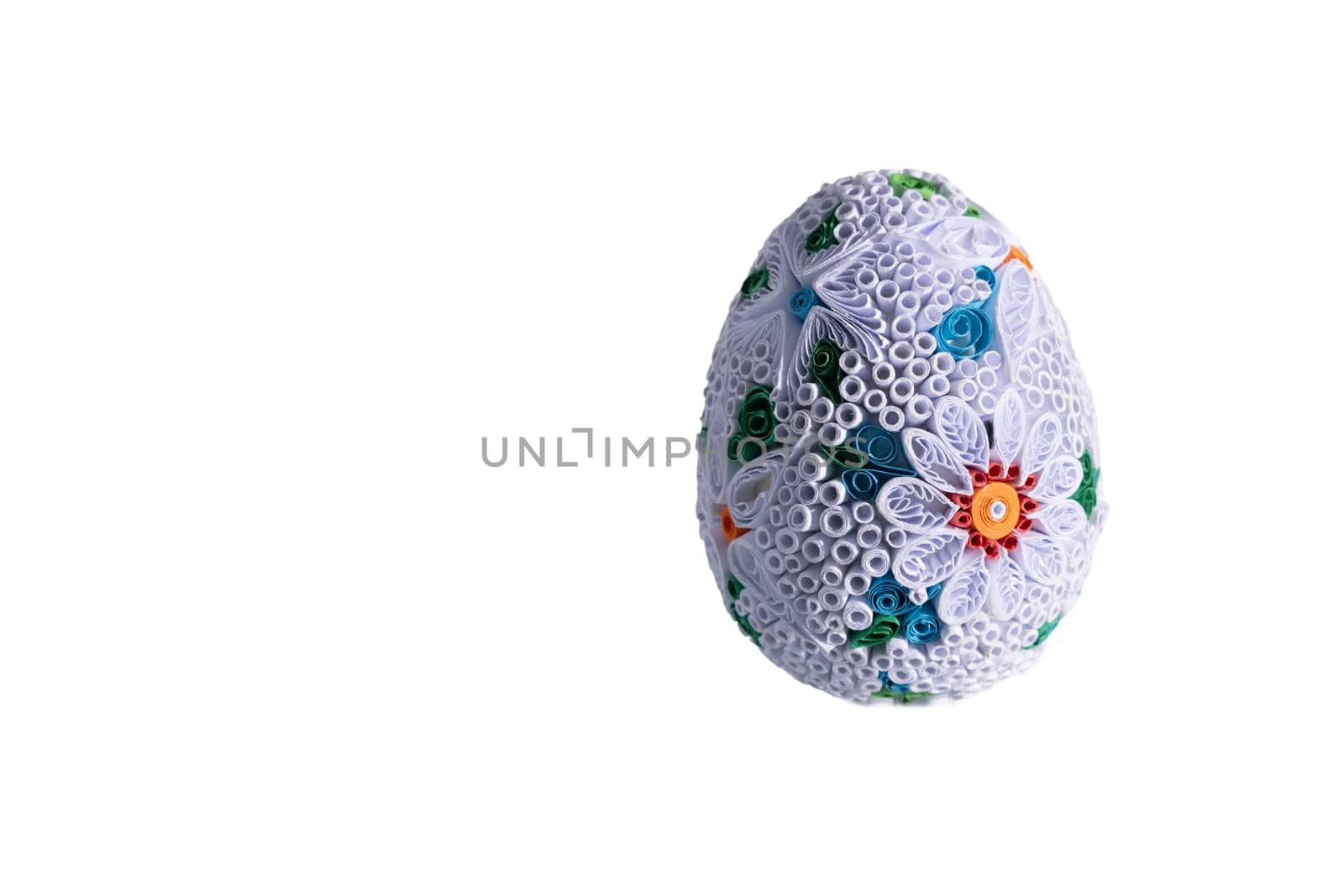 One unique egg decorated for the Easter holiday. Christian holiday and decorations accompanying the ceremony.