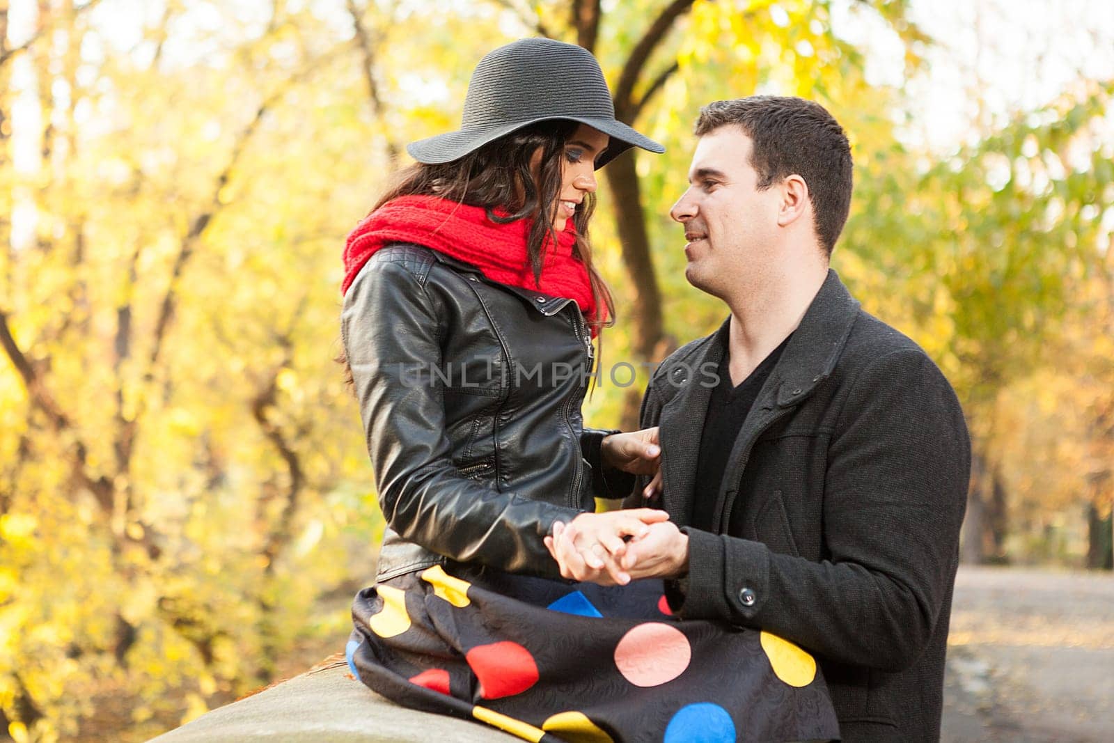 Beautiful gourgeous caucasian couple in autumn park