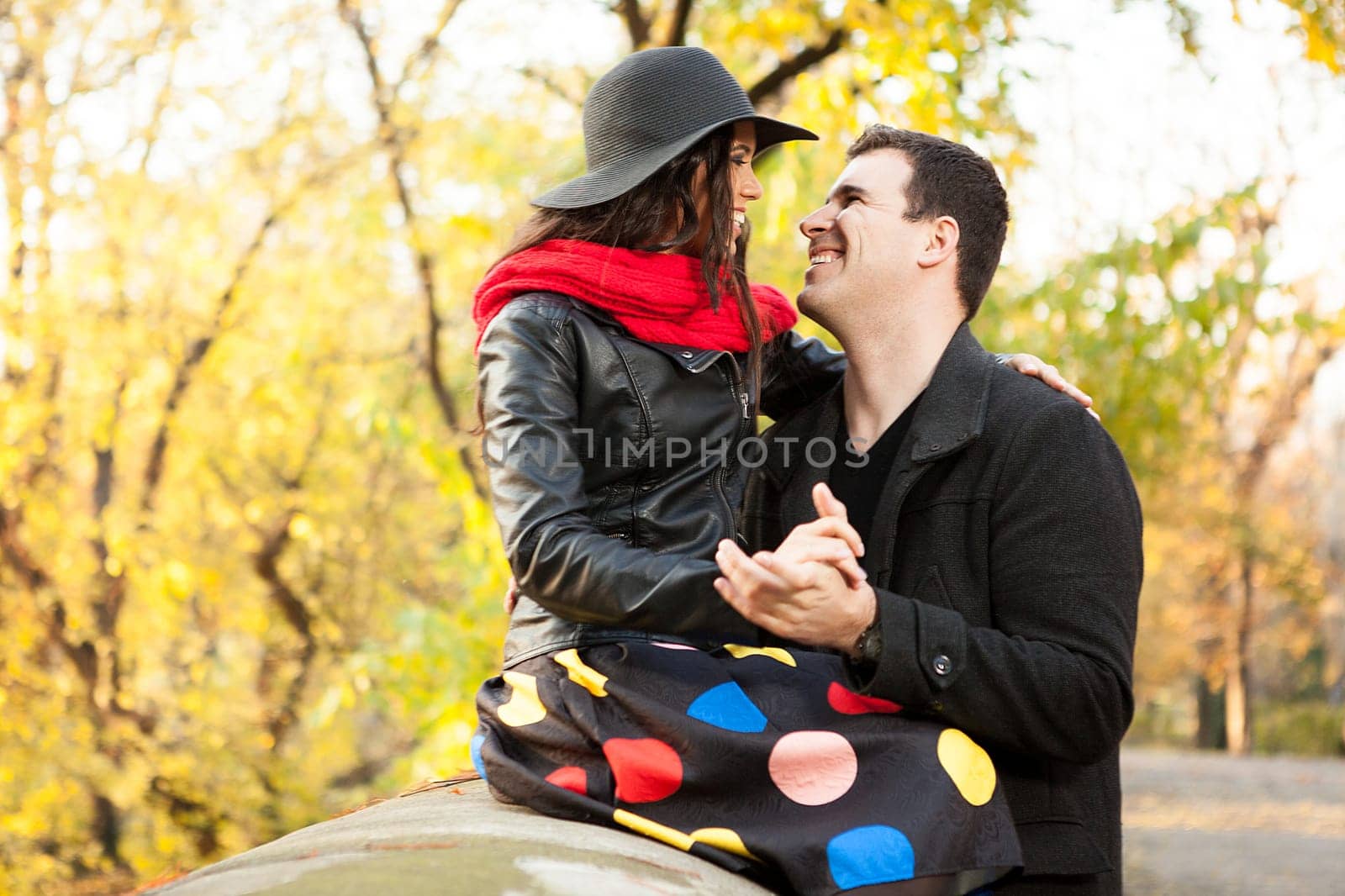 Beautiful gourgeous caucasian couple in autumn park