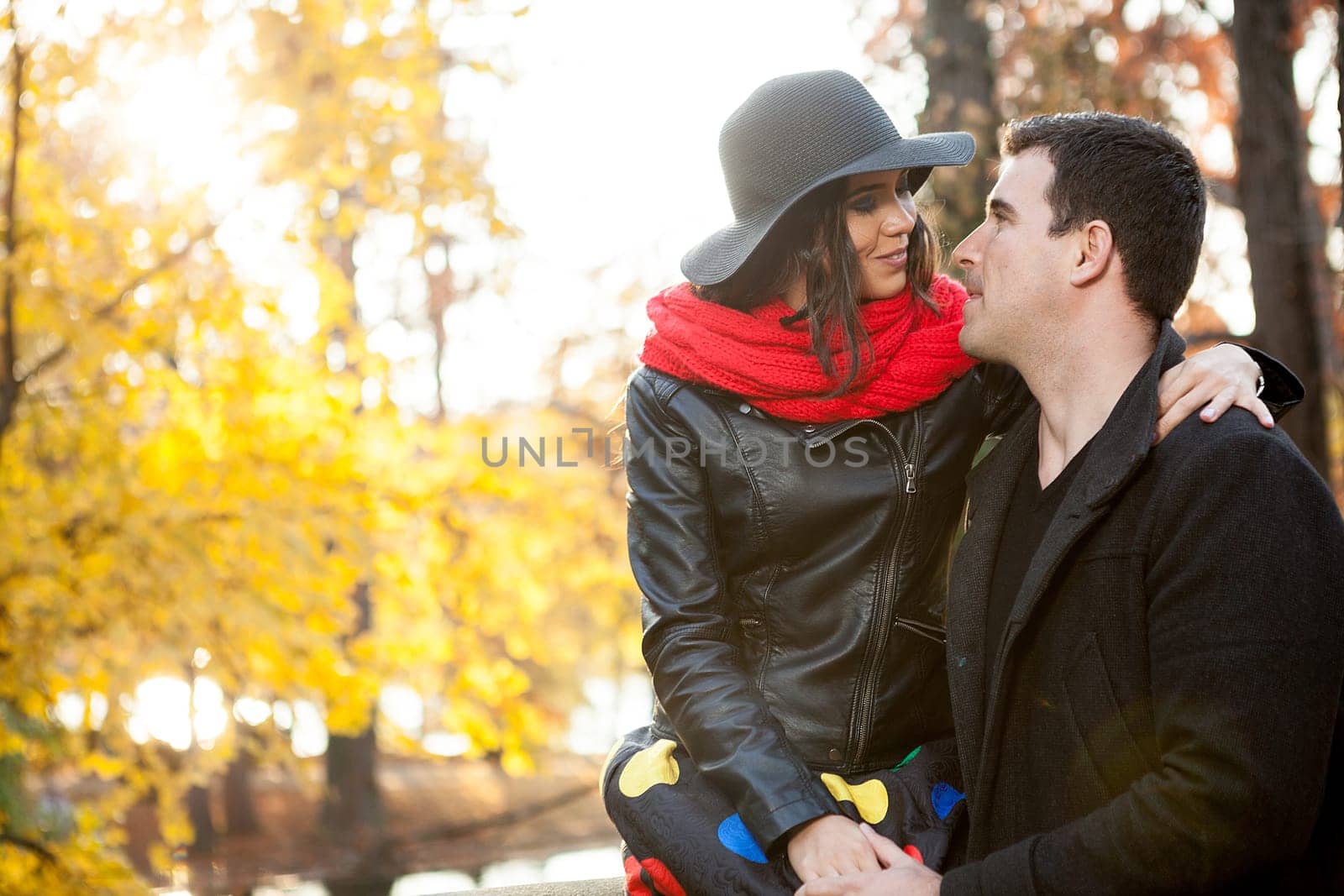 Beautiful gourgeous young couple in autumn park