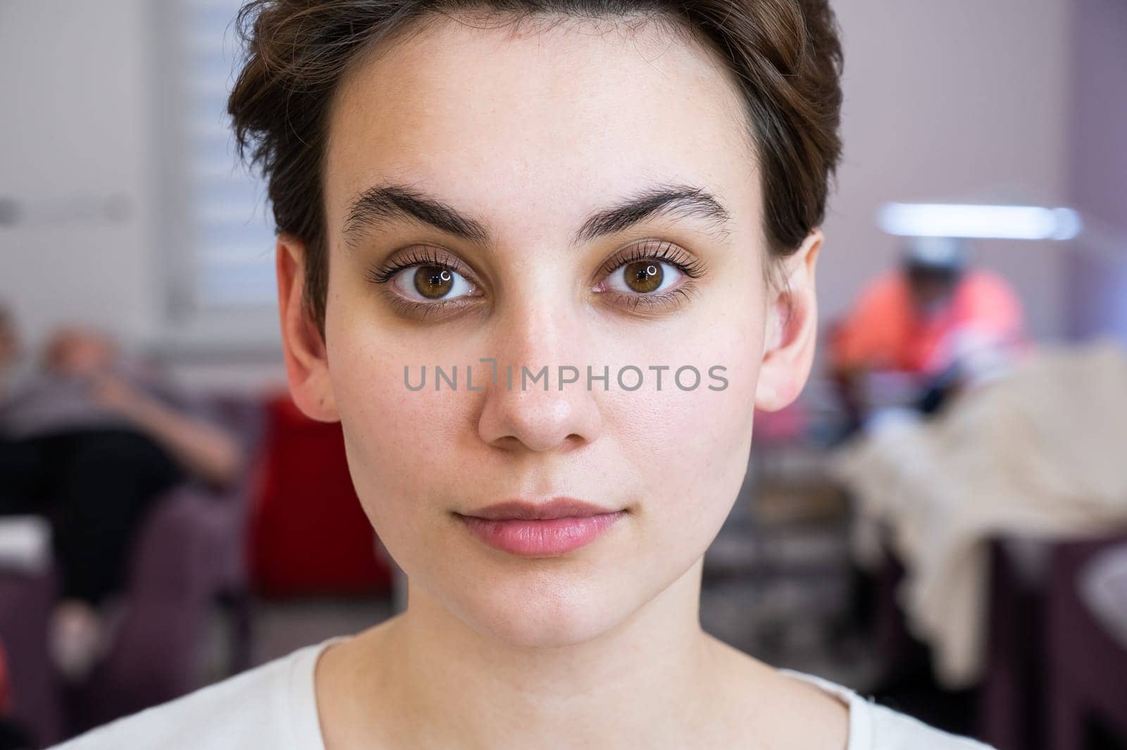 Portrait of a caucasian woman after eyelash lamination procedure