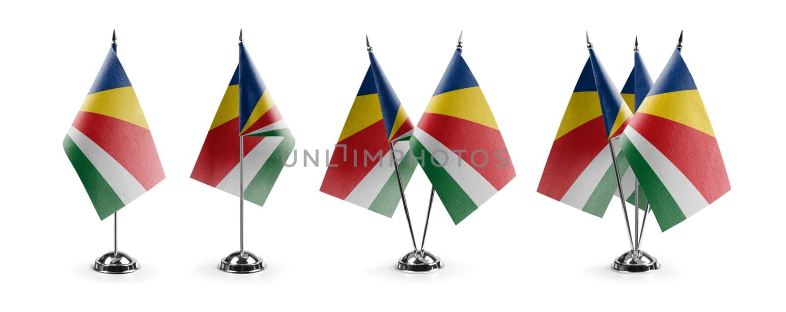Small national flags of the Seychelles on a white background by butenkow