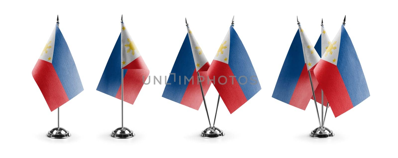 Small national flags of the Philippines on a white background by butenkow