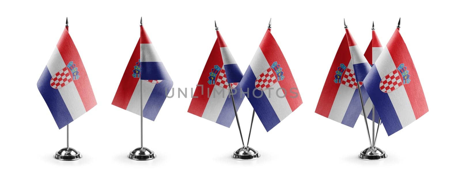 Small national flags of the Croatia on a white background by butenkow