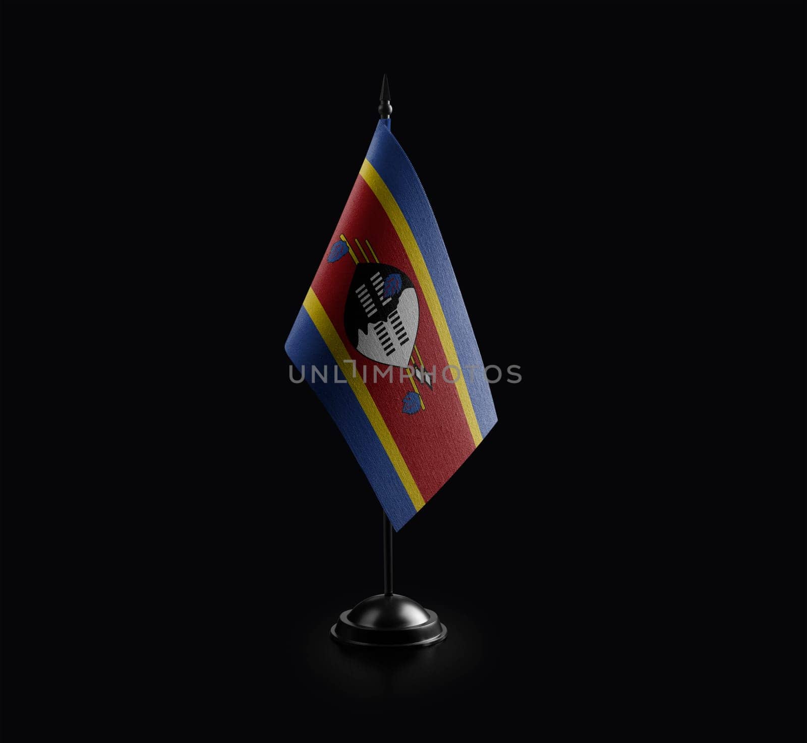Small national flag of the Swaziland on a black background by butenkow