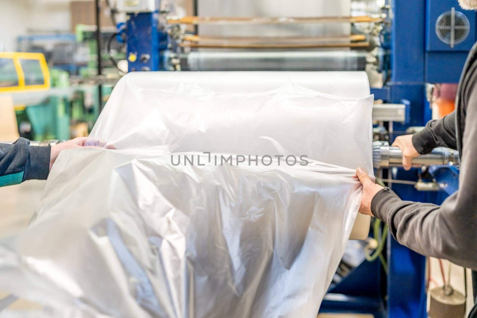 large plastic roll in the factory for the production of plastic packaging material and bags. 