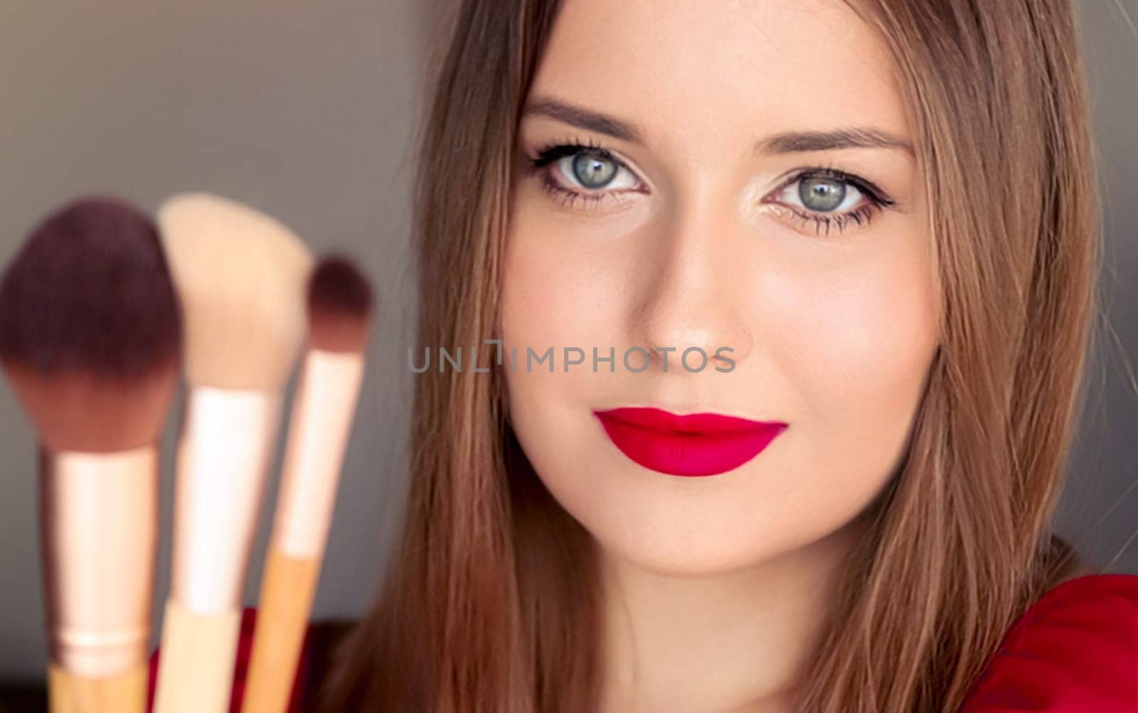 Beauty, makeup and cosmetics, face portrait of beautiful woman with make-up brushes, luxury cosmetic product, makeup artist or beauty blogger concept by Anneleven