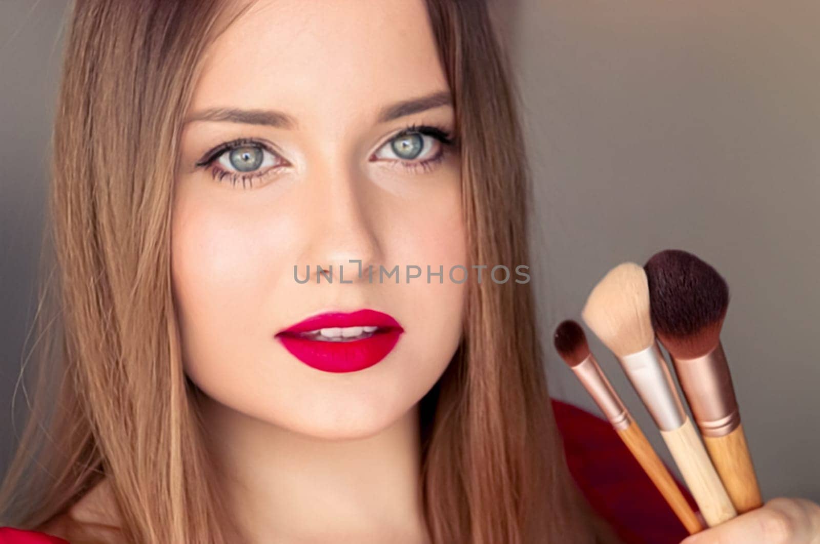 Beauty, makeup and cosmetics, face portrait of beautiful woman with make-up brushes, luxury cosmetic product, makeup artist or beauty blogger concept by Anneleven