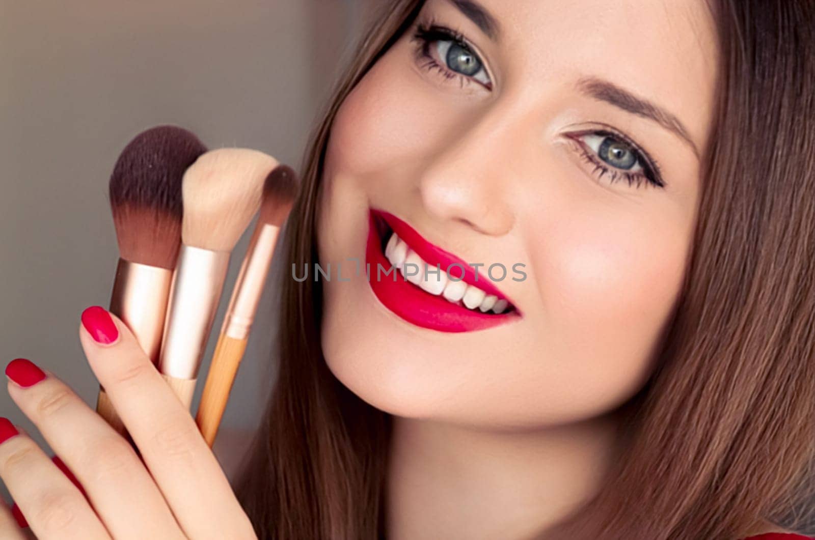 Beauty, makeup and cosmetics, face portrait of beautiful woman with make-up brushes, luxury cosmetic product, makeup artist or beauty blogger concept.