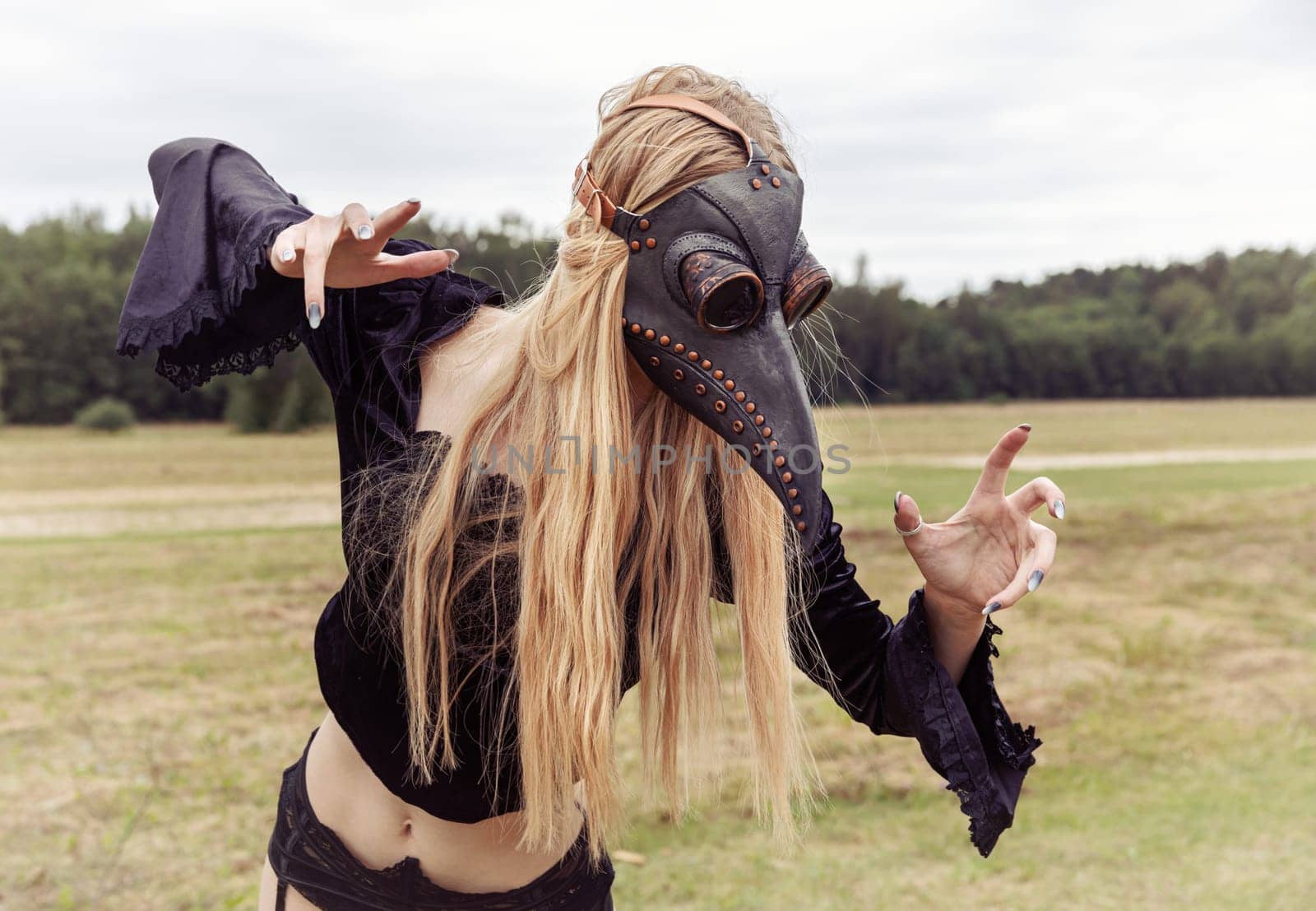 A mysterious and surreal portrait of a young woman in a plague mask.