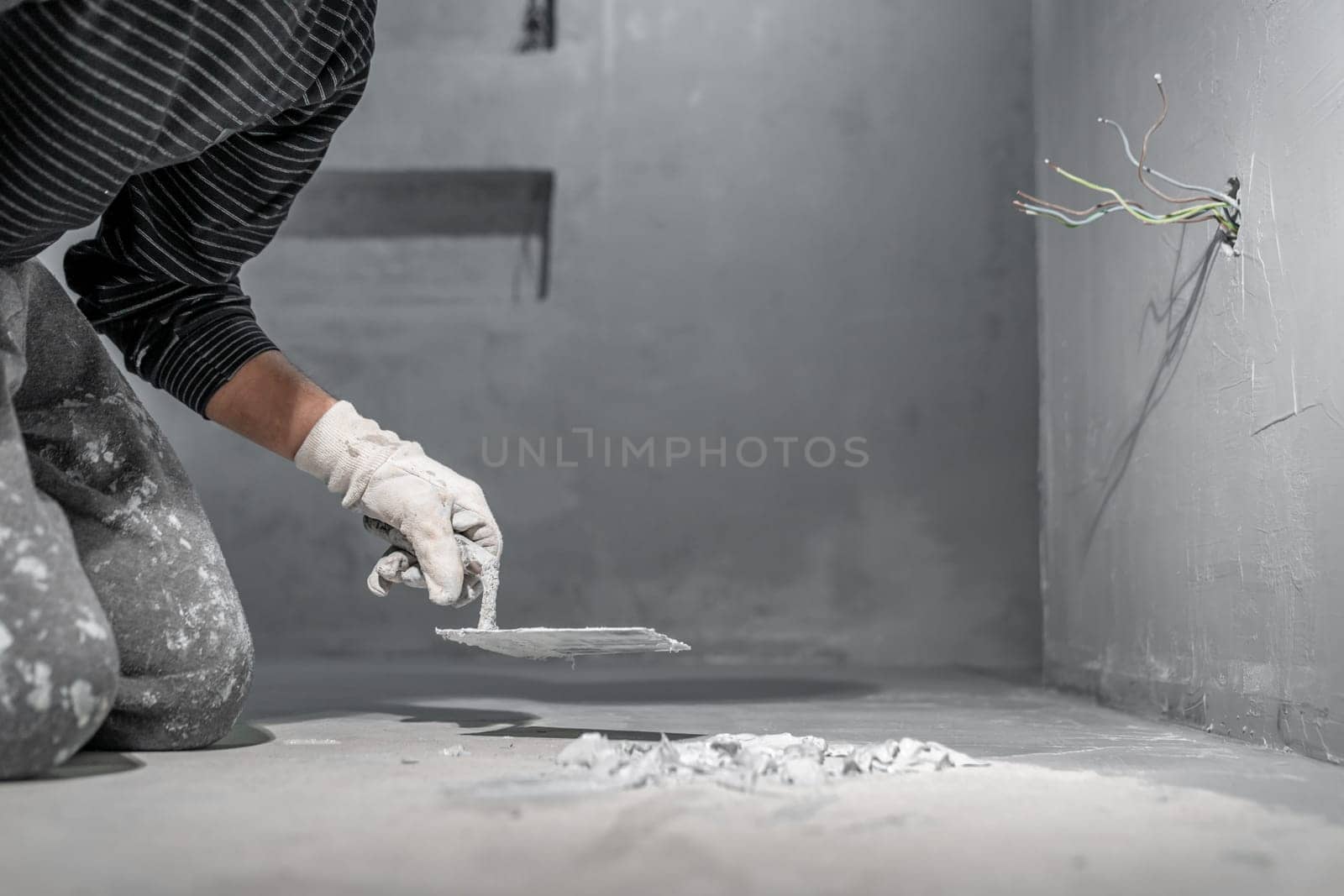 masonry work with a trowel on the construction site. High quality photo