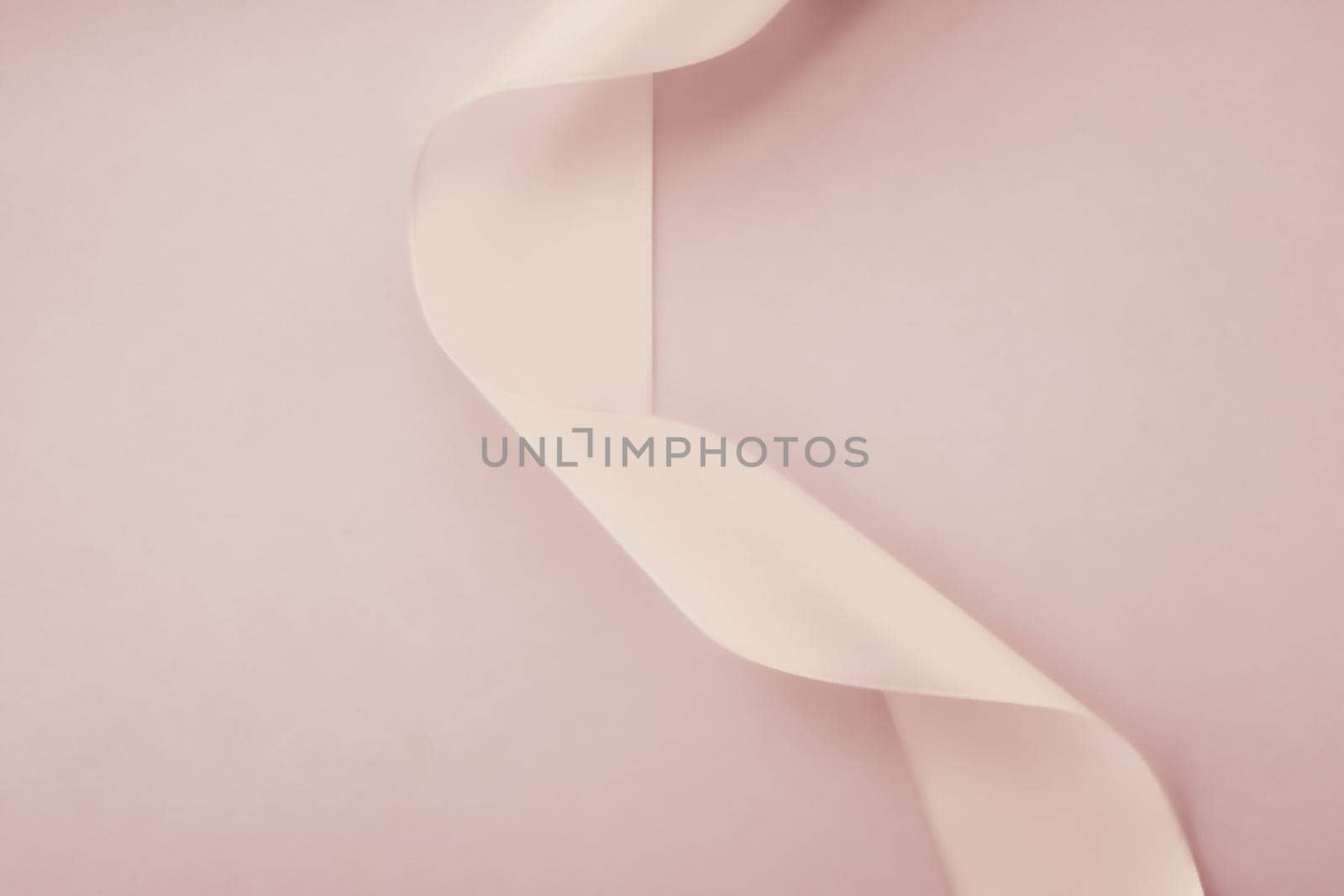 Branding, holidays and luxe brands concept - Abstract curly silk ribbon on pastel background, exclusive luxury brand design for holiday sale product promotion and glamour art invitation card backdrop