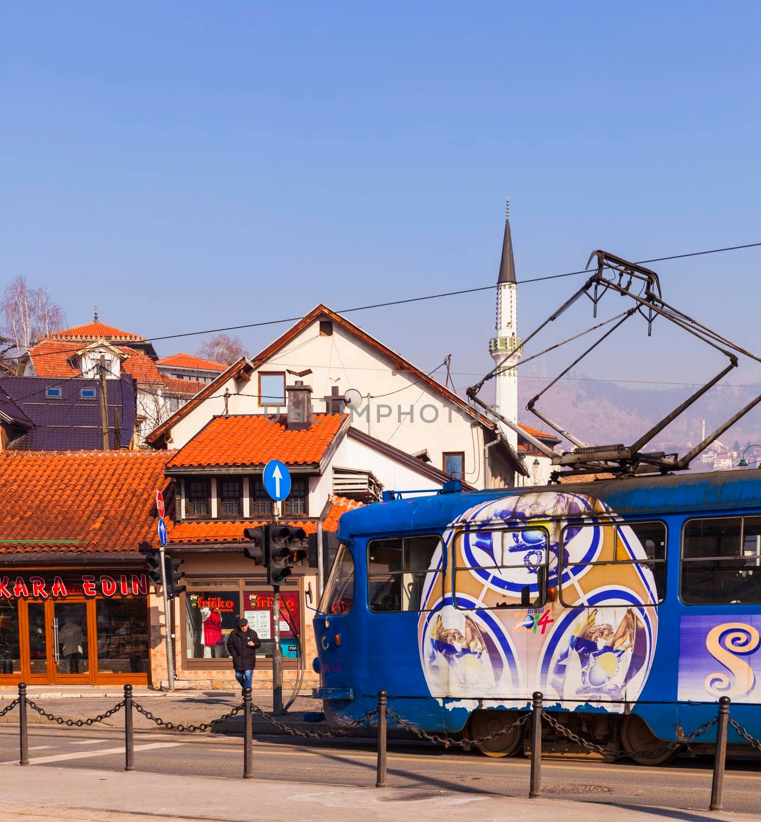 SARAJEVO, BOSNIA-ERZEGOVINA - FEBRUARY, 15: Tram waiting at traffic light in Sarajevo on February 15, 2018