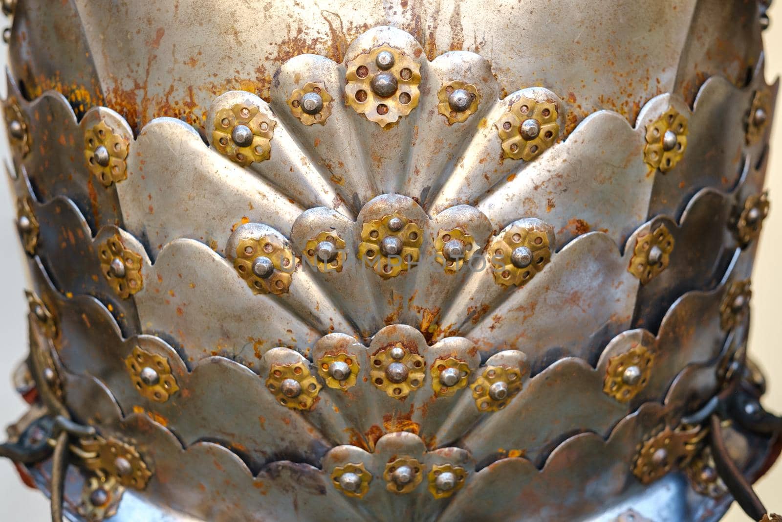 Parts of ancient knight's armor.A medieval concept.Metallic texture.