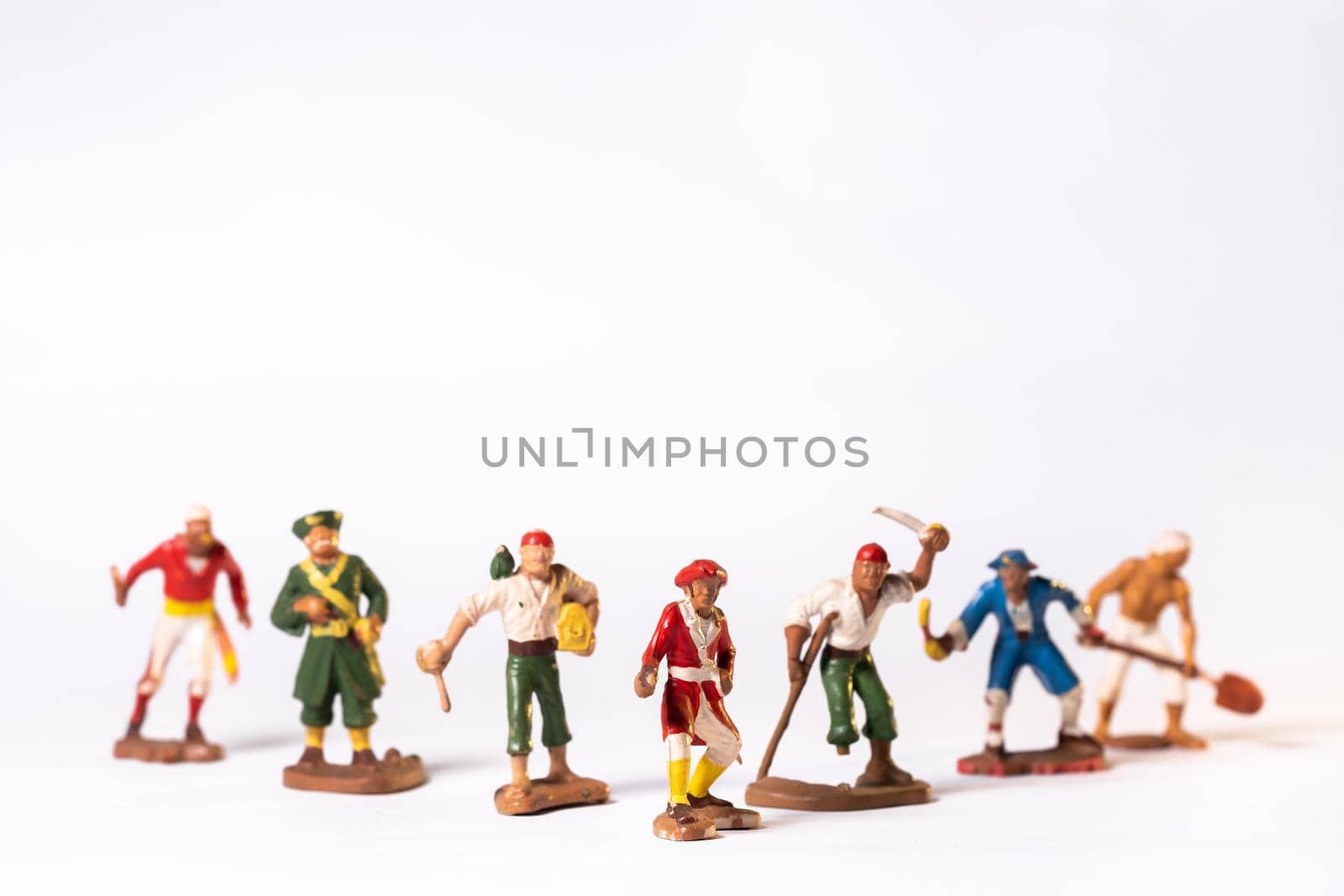 Vintage pirate toys isolated on white background.