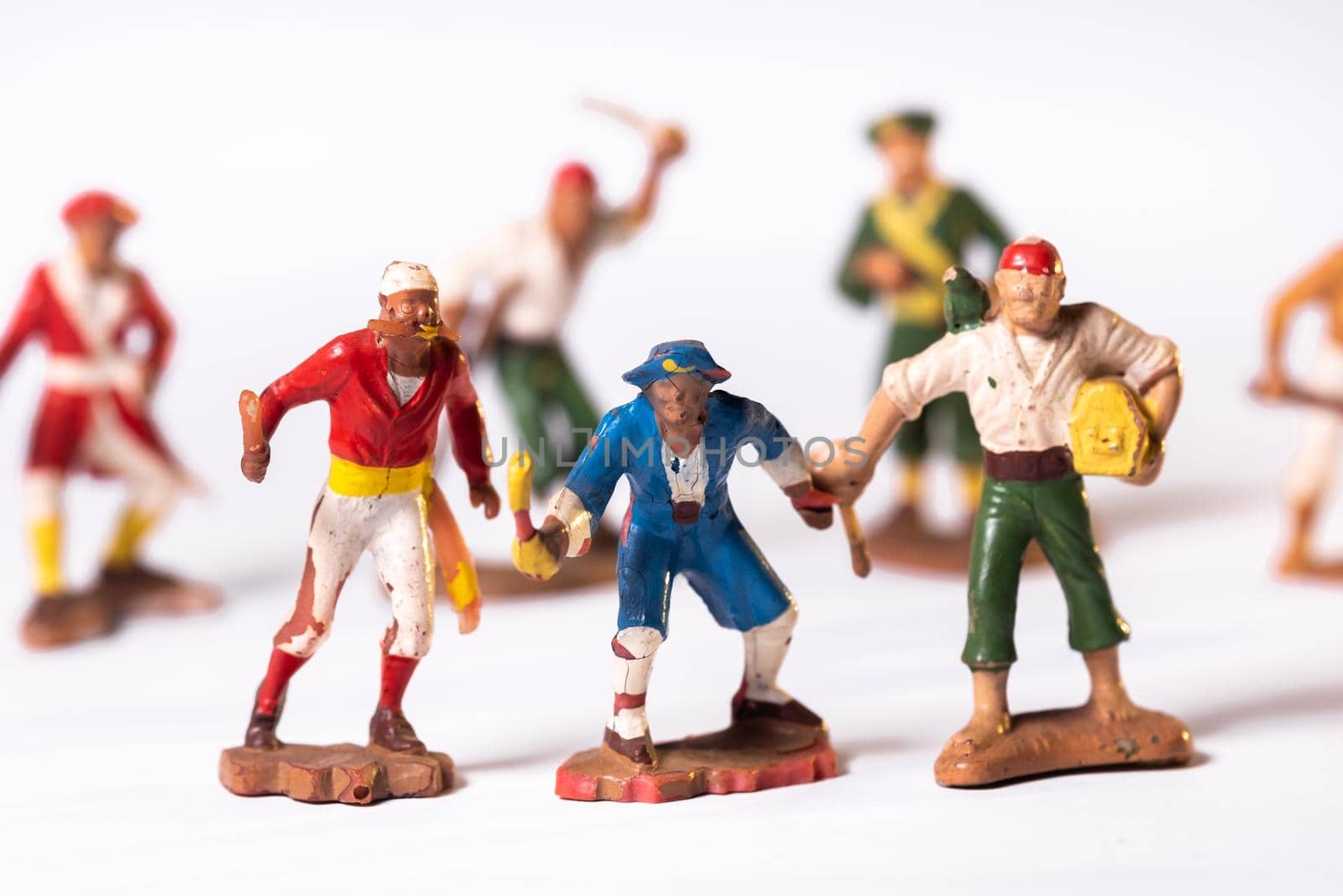 Vintage pirate toys isolated on white background.