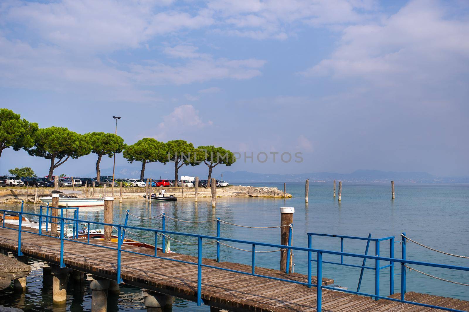 The promenade and pier in Sirmione on Lake Garda.Italy.Tuscany.