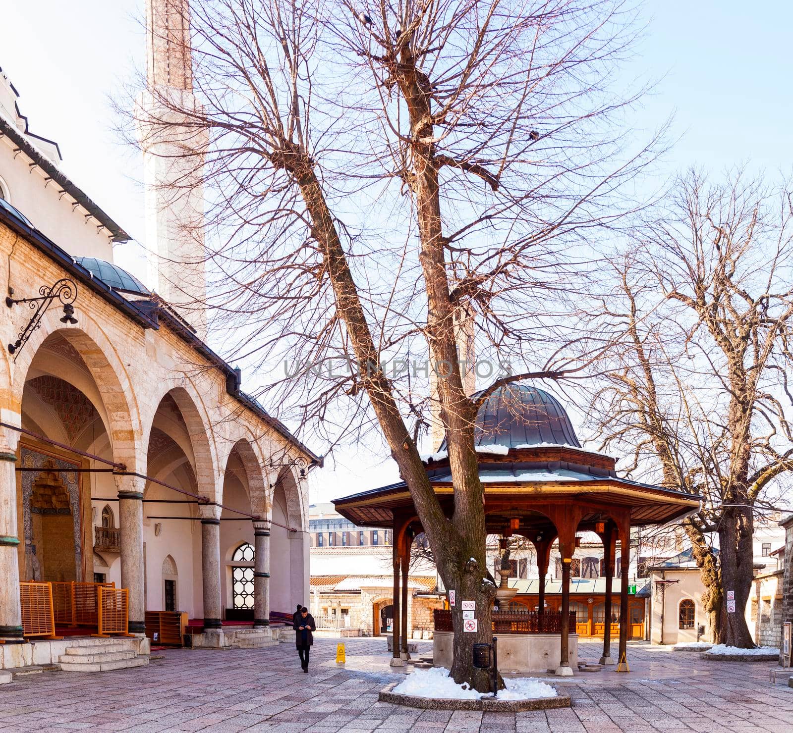 SARAJEVO, BOSNIA-ERZEGOVINA - FEBRUARY, 16: View of the Shadirvan Fountain on courtyard of Gazi Husrev-bey Mosque in Sarajevo on February 16, 2018