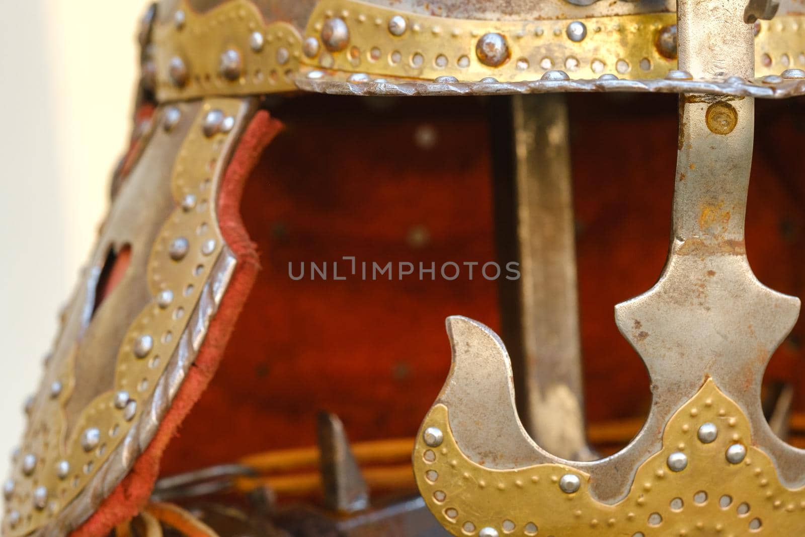 An ancient Knight's helmet with armor.A medieval concept.