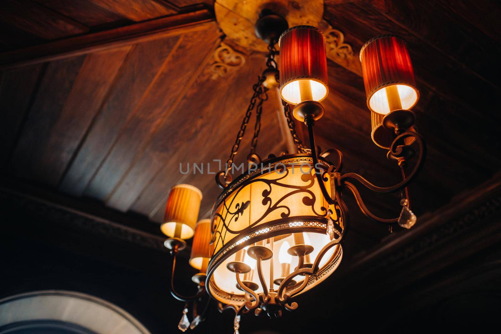 Antique crystal chandelier chandelier in the palace. Large chandelier in the castle.