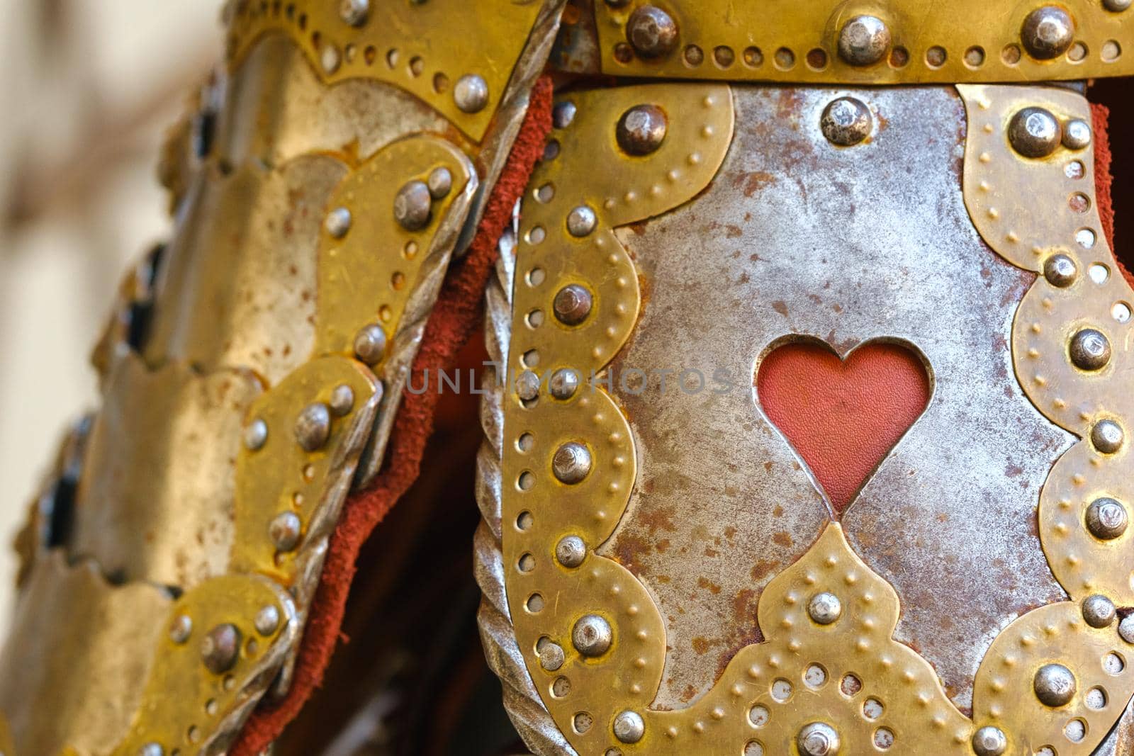 An ancient Knight's helmet with armor.A medieval concept.