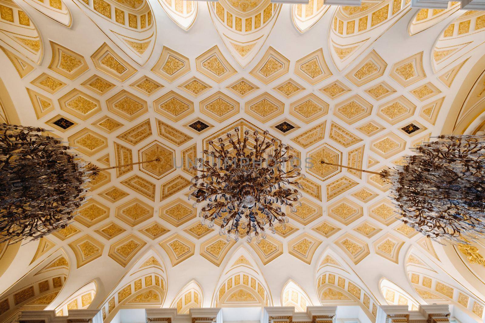 Antique crystal chandelier chandelier in the palace. Large chandelier in the castle.