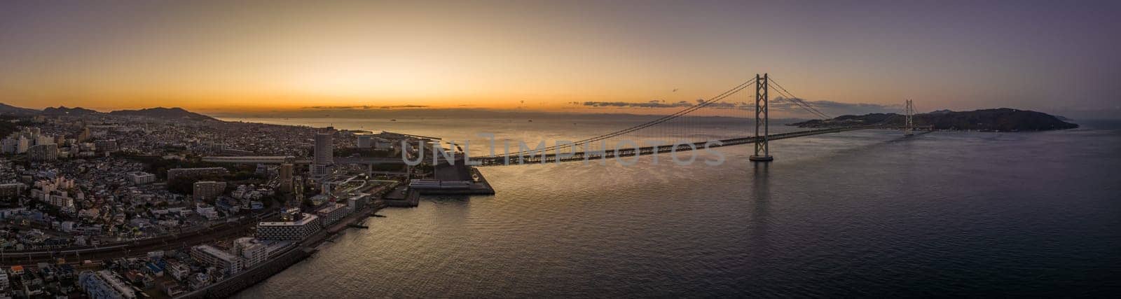 Panoramic aerial view of Akashi Bridge between Maiko and Awaji Island by Osaze