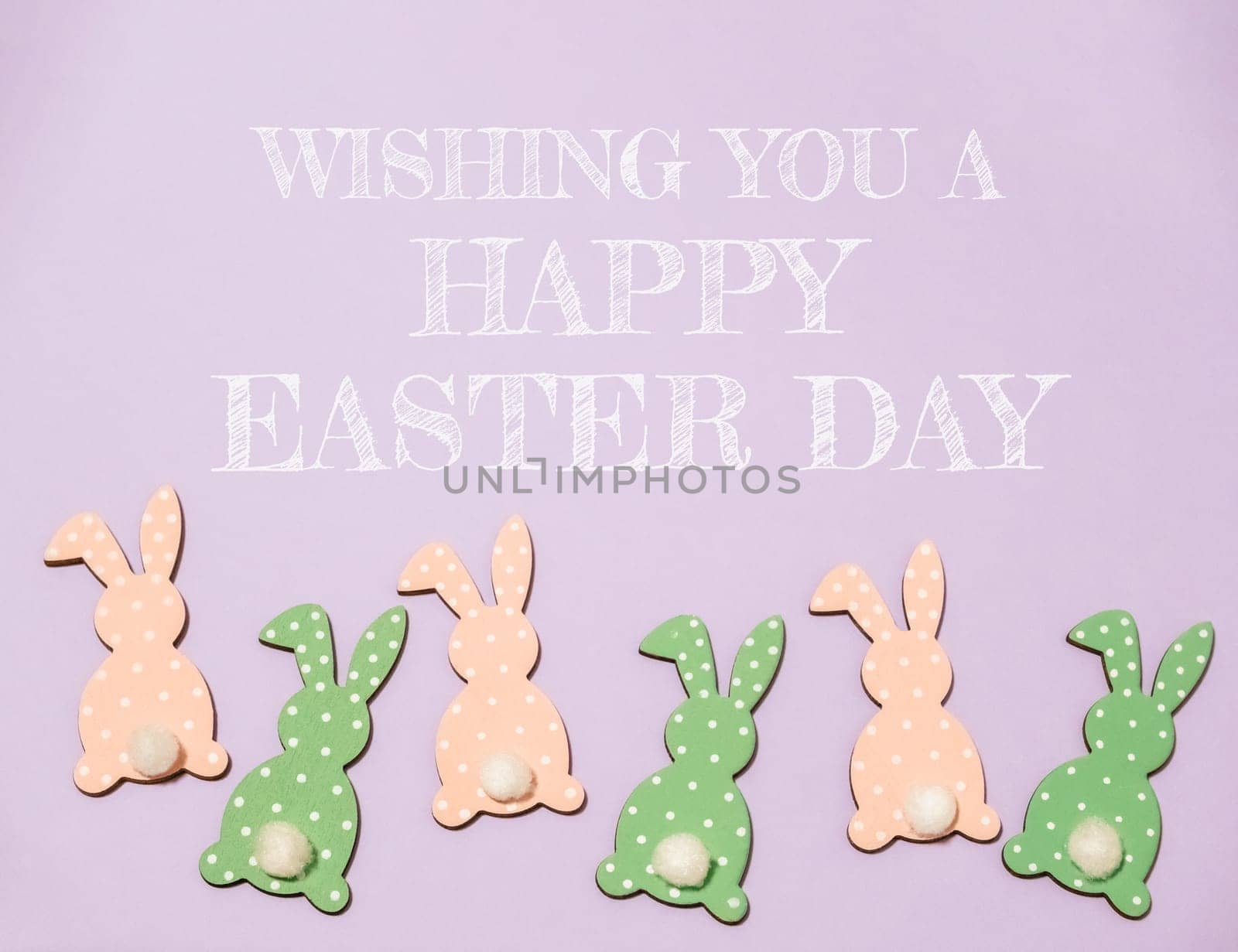 Easter still life with sample text wishing you a happy easter day. High quality photo