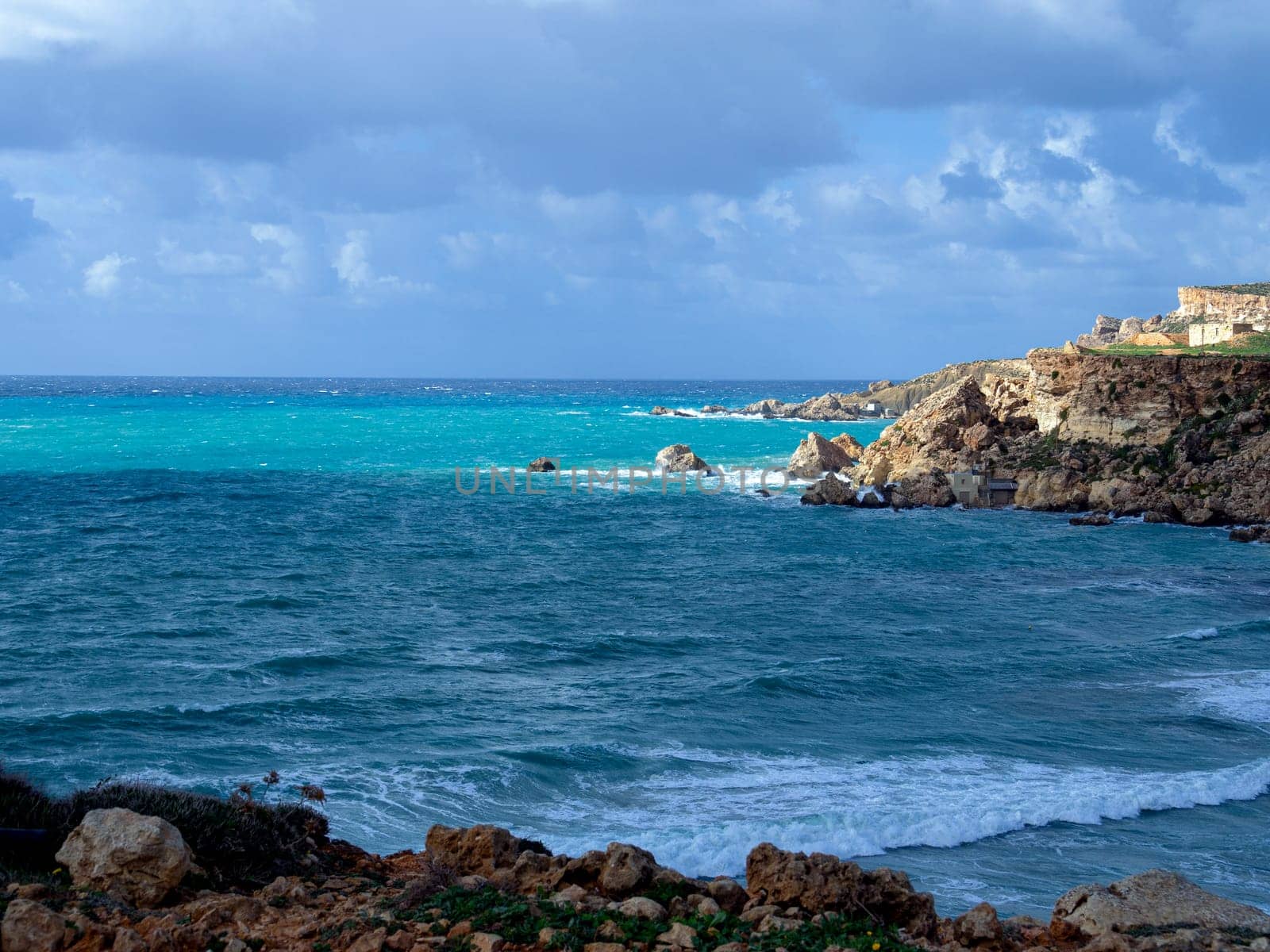 Golden Bay beach, Maltese islands. landscape. windy cloudy weather