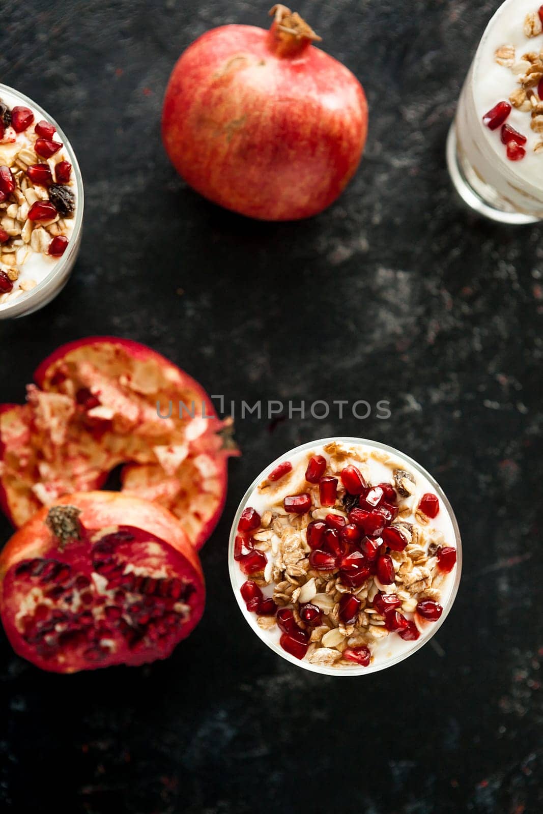 Top view on dessert with yoghurt and pomegranate by DCStudio