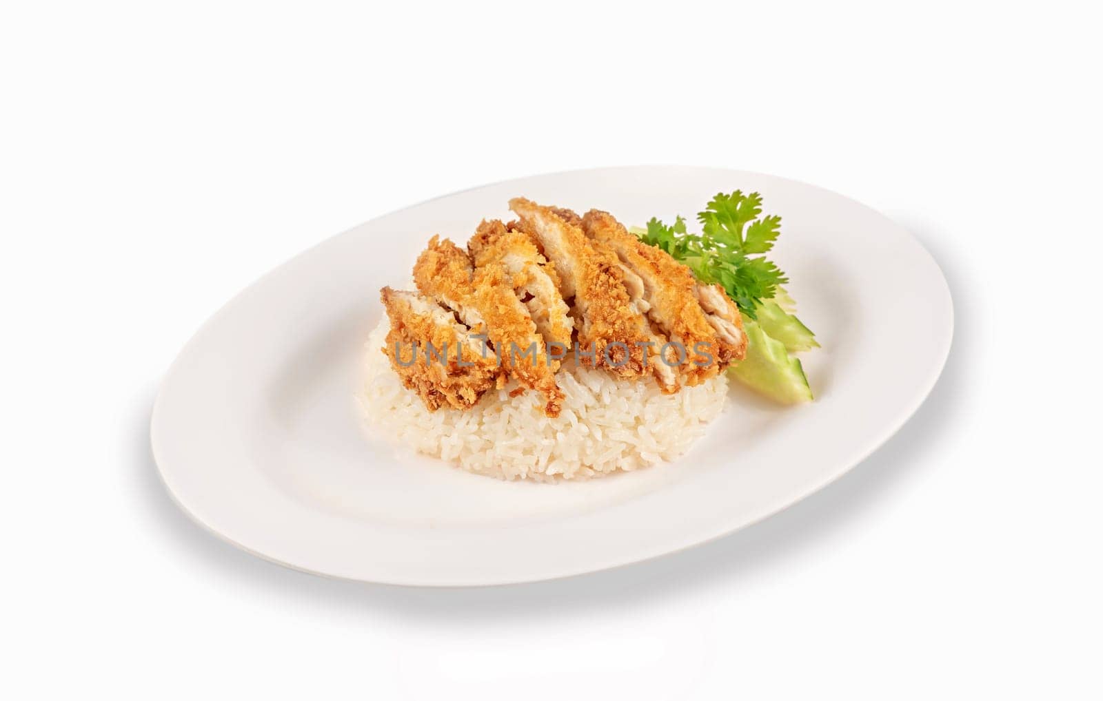 deep fried chicken with garlic served with steamed rice on dish over white background