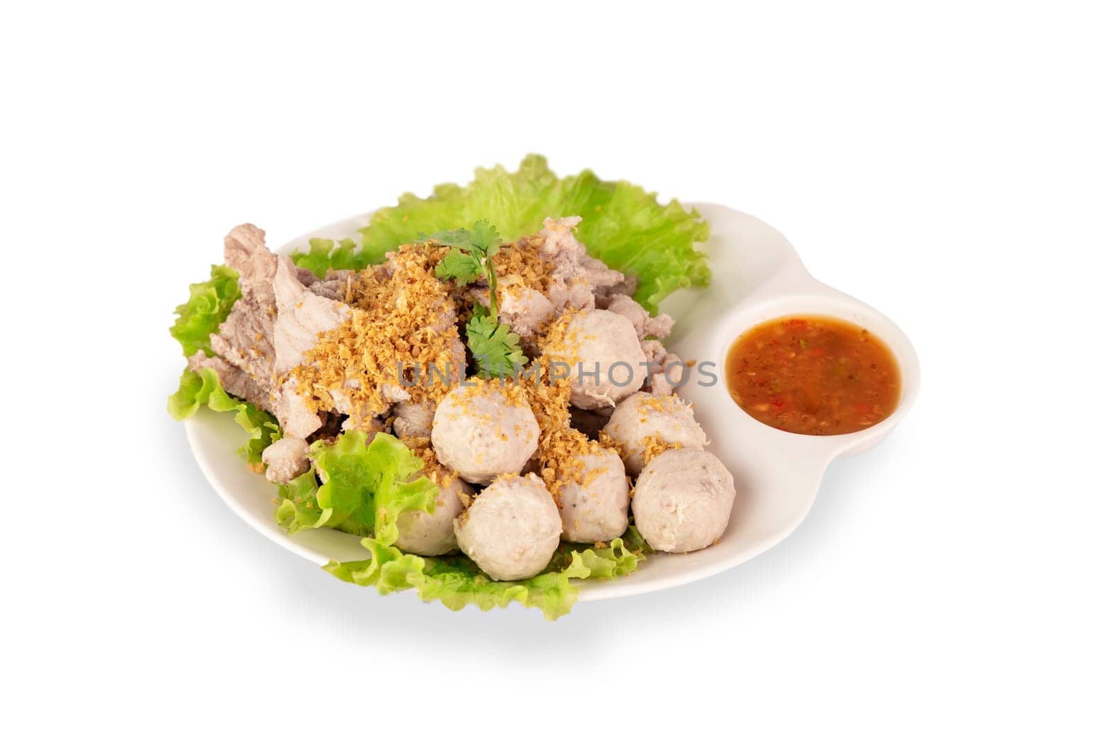 steamed meatballs and  pork served with vegetables and spicy sauce