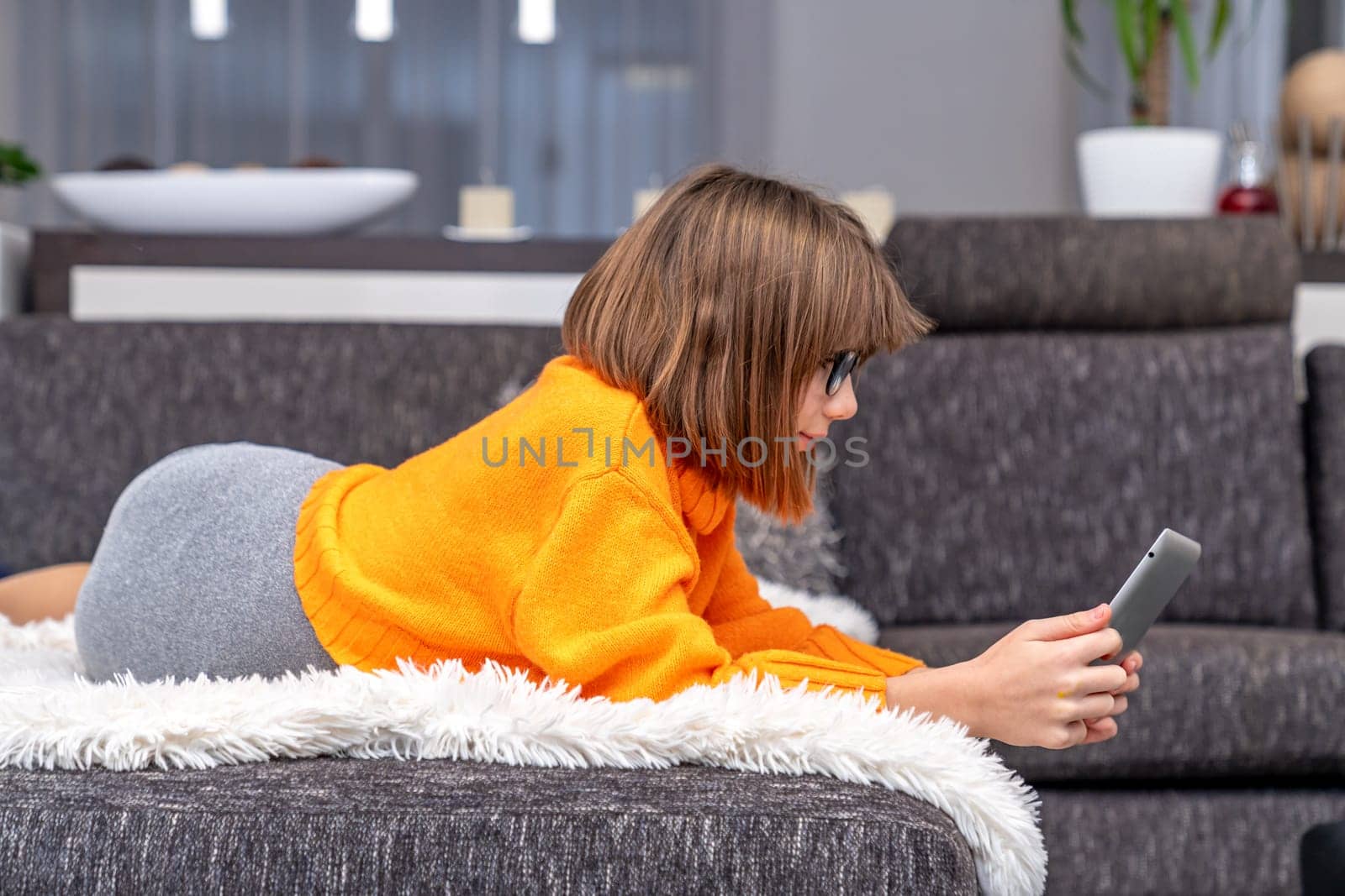 a child communicates online on a smartphone. High quality photo