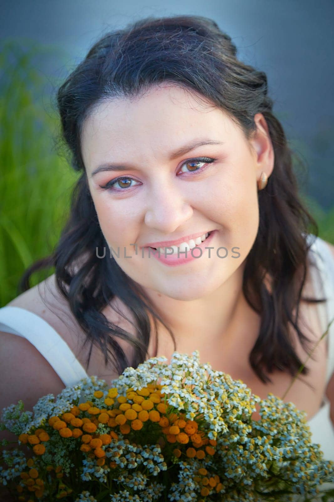 Portrait of Slavic plump chubby girl on the feast of Ivan Kupala with flowers on a summer evening by keleny