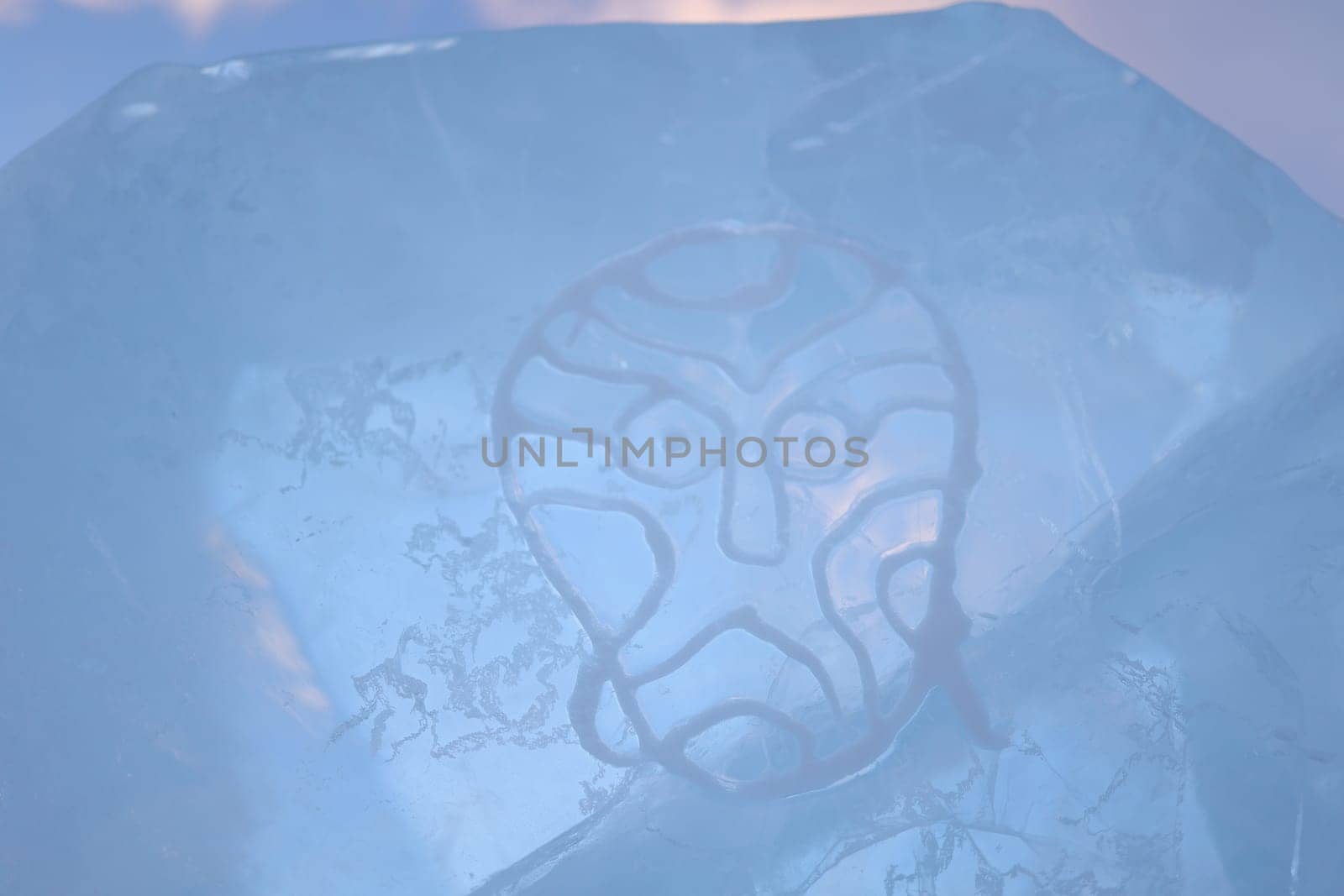 A shaman's mask painted on an ice floe on Lake Baikal on Olkhon Island