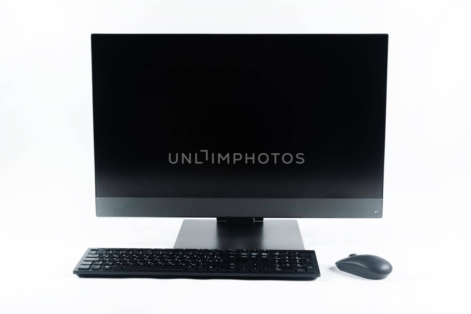 monoblock with keyboard and mouse on a white background.The computer is on white isolate by Lobachad