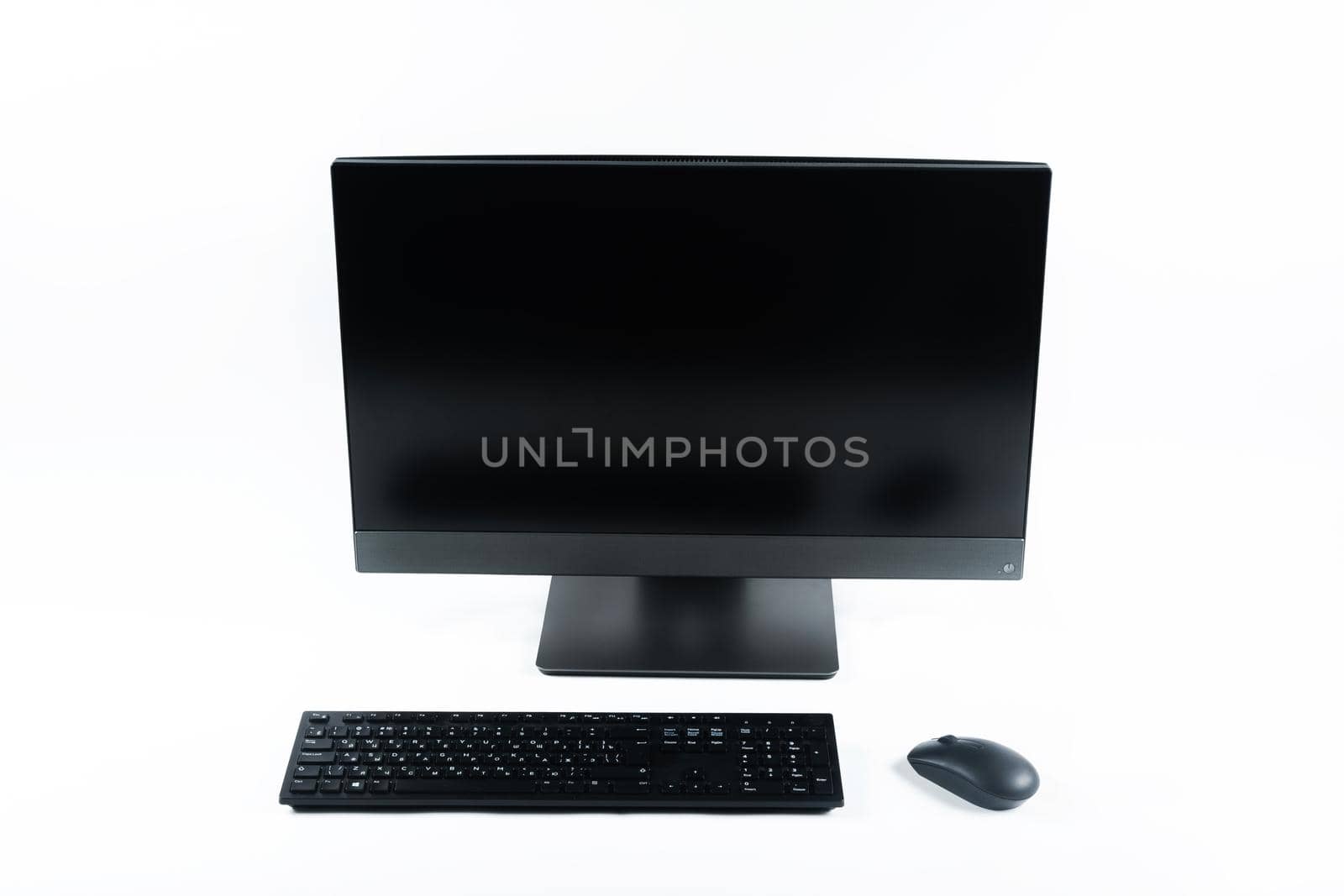 monoblock with keyboard and mouse on a white background.The computer is on white isolate by Lobachad