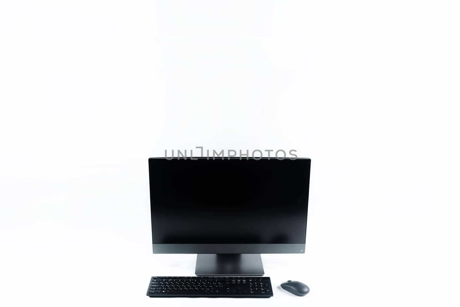 monoblock with keyboard and mouse on a white background.The computer is on white isolate by Lobachad
