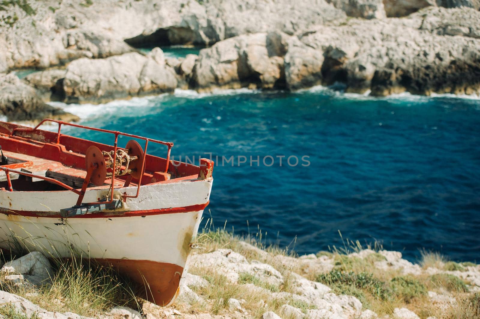 The rocky Porto Limnionas beach on Zakynthos island, Greece.