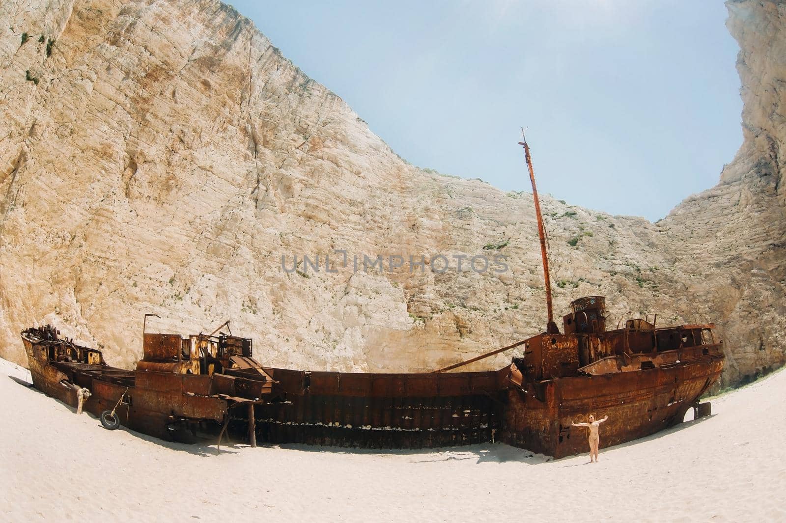 curved ship on Zakynthos island, Greece Navagio beach, or shipwreck beach,sometimes called smugglers ' Bay , on the coast of Zakynthos island, in the Ionian Islands of Greece