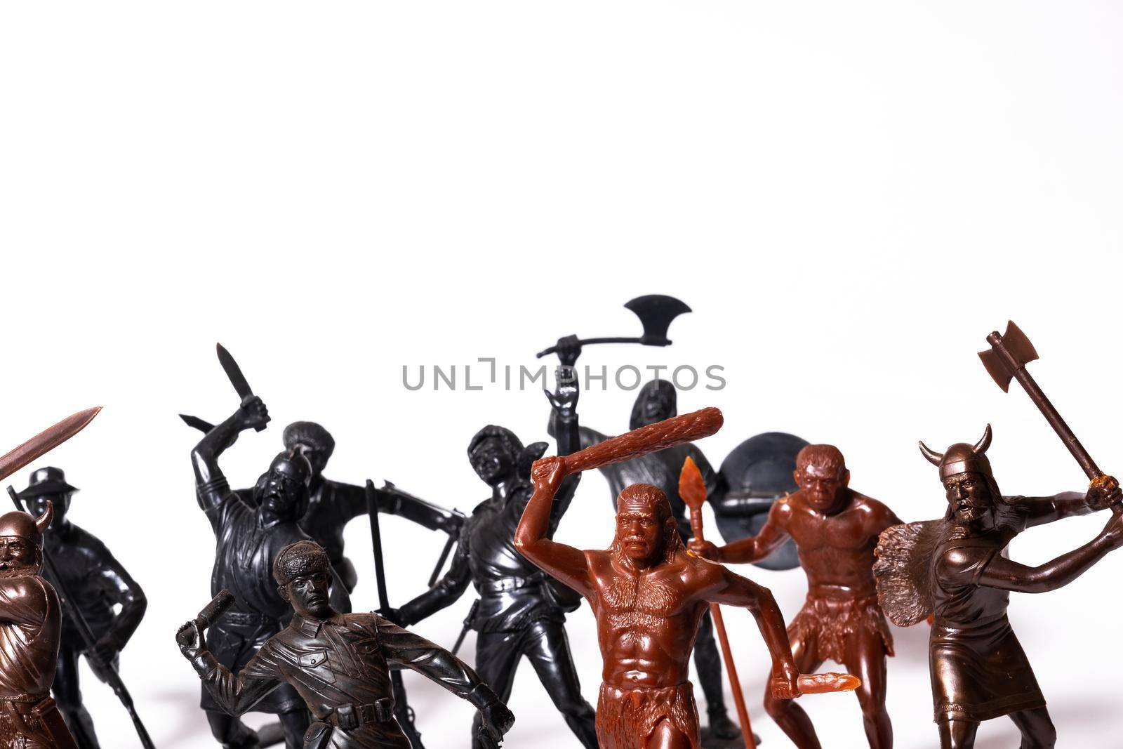 A set of different toy figures of soldiers on a white background.