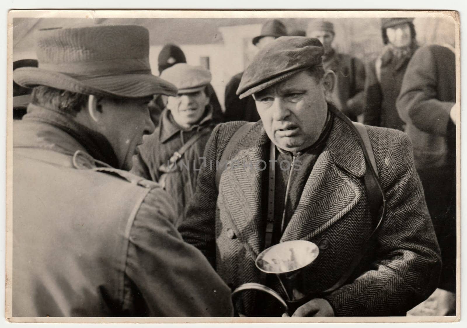 THE CZECHOSLOVAK SOCIALIST REPUBLIC, CIRCA 1960s: Vintage photo shows men after hunting, circa 1960s.