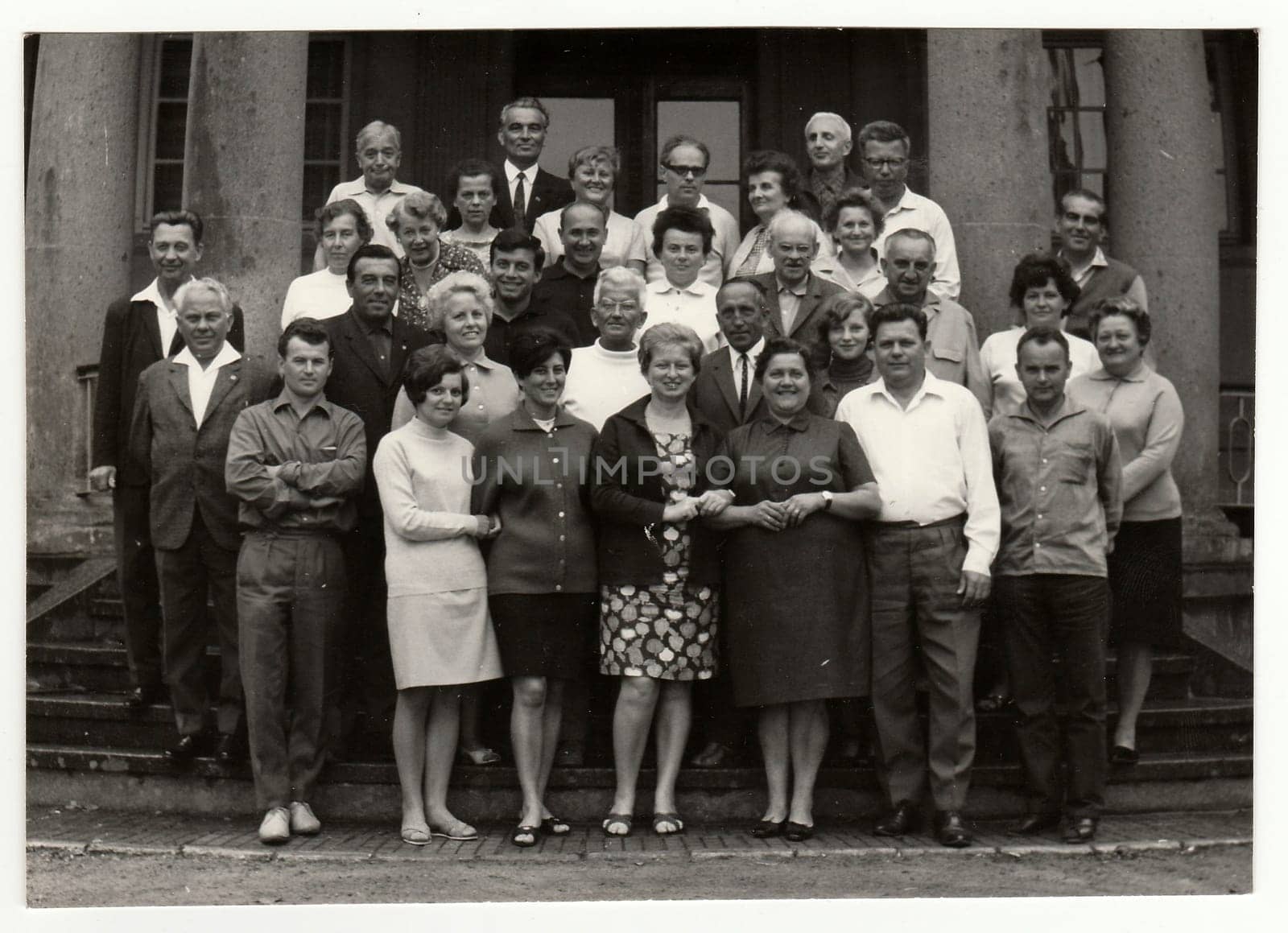 THE CZECHOSLOVAK SOCIALIST REPUBLIC, CIRCA 1970s: Vintage photo shows group of people in front of building, circa 1970s.