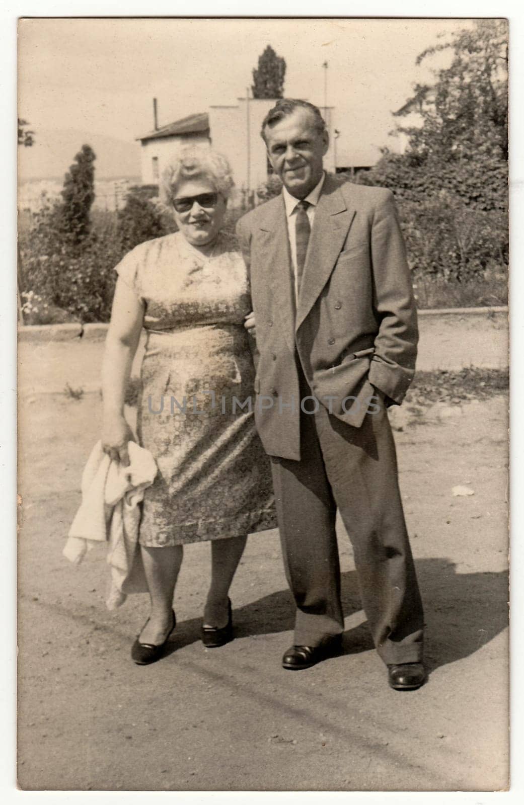 Vintage photo shows marital couple, circa 1970s. by roman_nerud