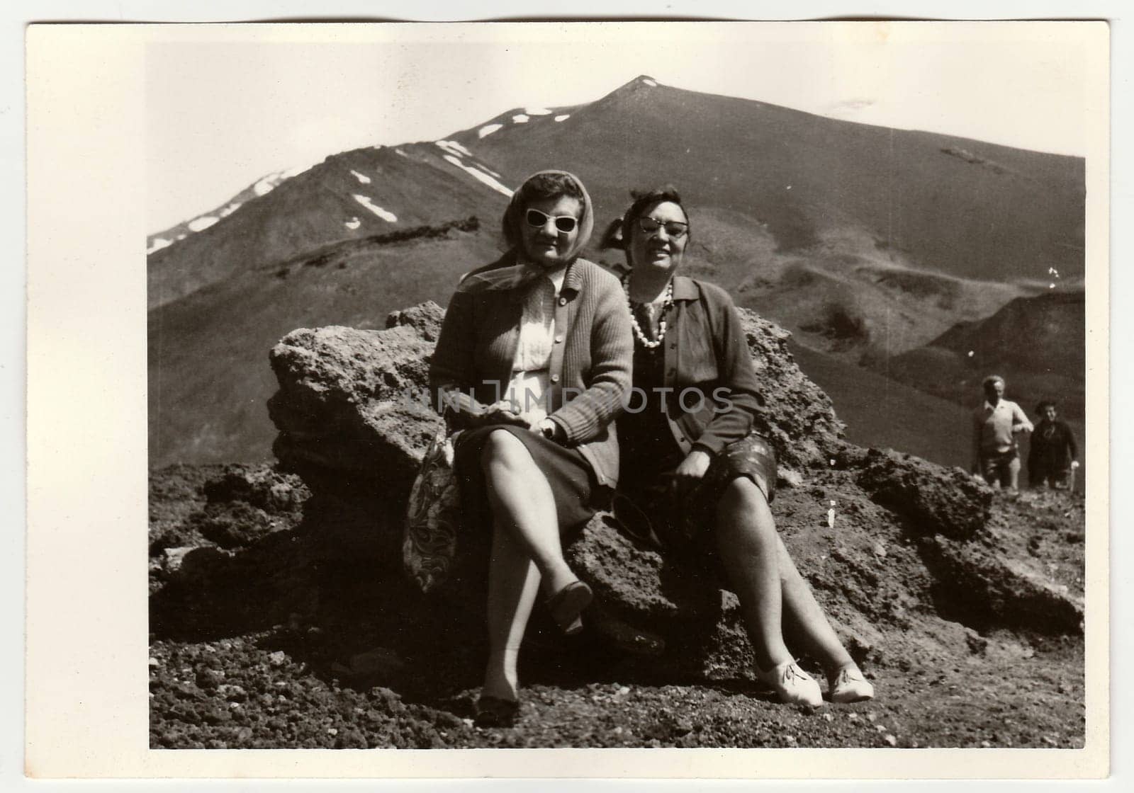 Vintage photo shows people on vacation, circa 1960s. by roman_nerud