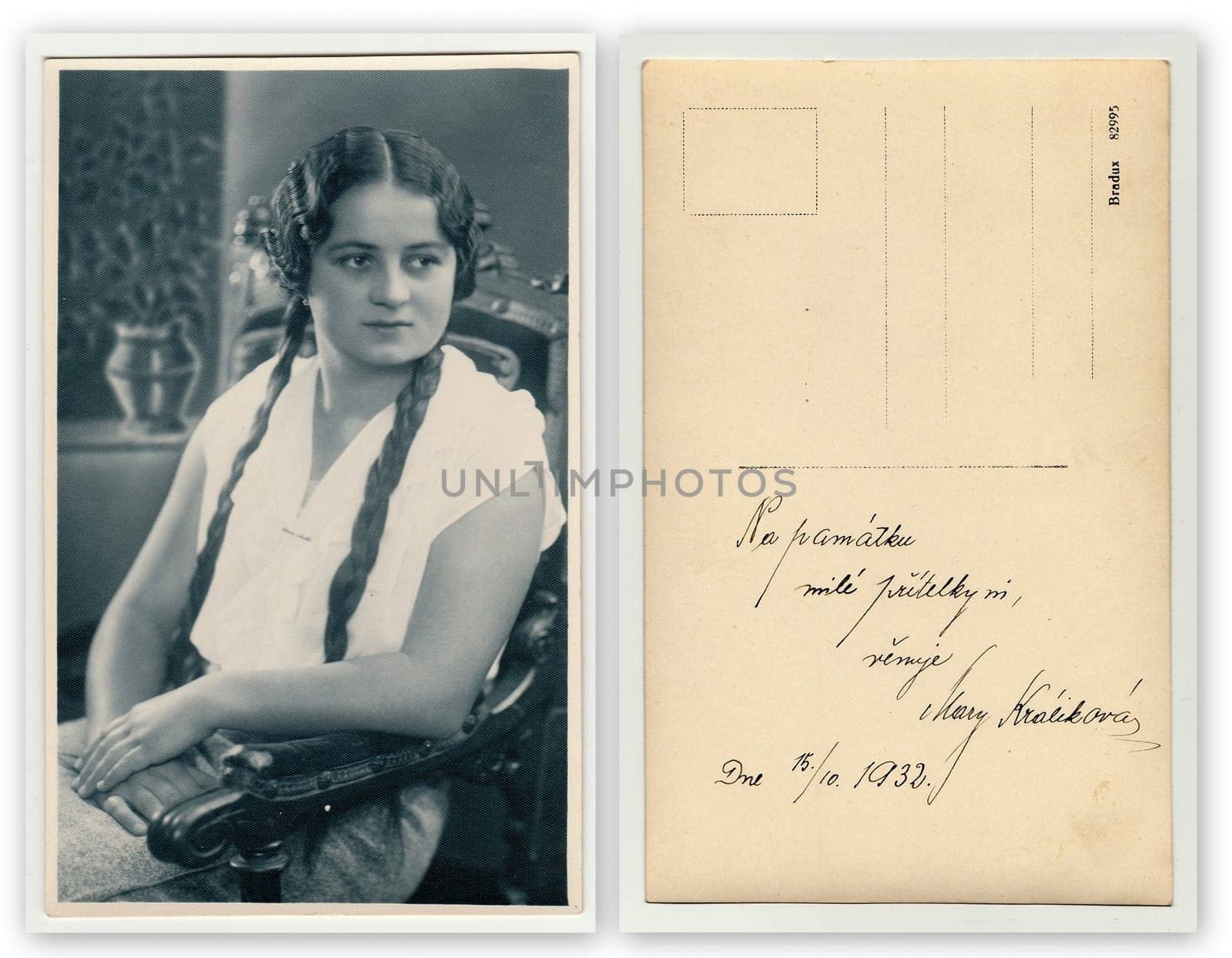 THE CZECHOSLOVAK REPUBLIC, OCTOBER 15, 1932: Front and back of vintage photo. Vintage portrait photo shows girl sits on a chair. Photo studio portrait, October 15, 1932.