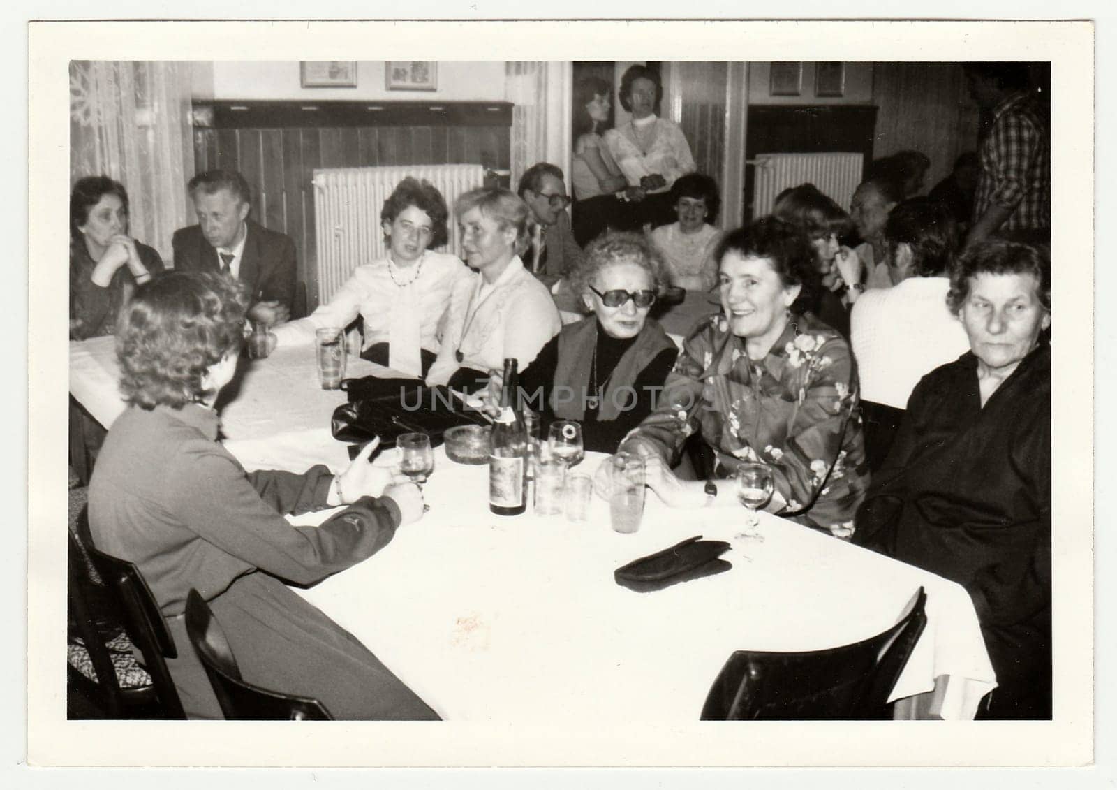 THE CZECHOSLOVAK SOCIALIST REPUBLIC, 1985: Vintage photo shows a group of people in the restaurant.